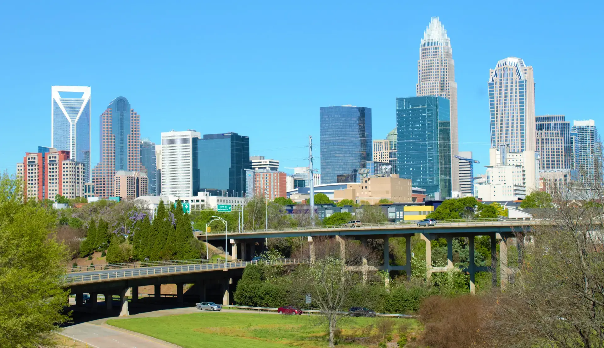 Uptown Charlotte, NC skyline with the Bank of America Corporate Center on a clear day Uptown Charlotte, NC skyline with the Bank of America Corporate Center on a clear day