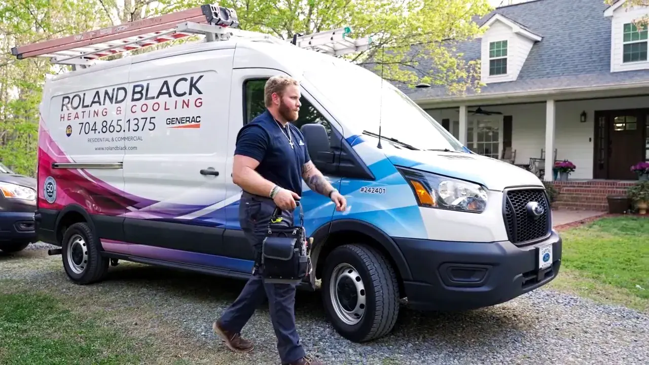 Roland Black electrician walking up to a Gaston County home for a panel repair call Roland Black electrician walking up to a Gaston County home for a panel repair call