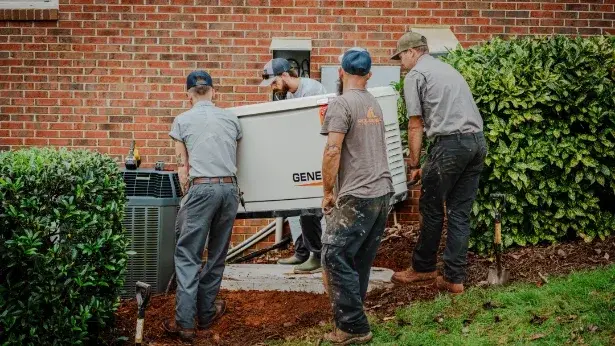 Roland Black crew servicing a Generac standby generator beside a home in Gastonia, NC Roland Black crew servicing a Generac standby generator beside a home in Gastonia, NC